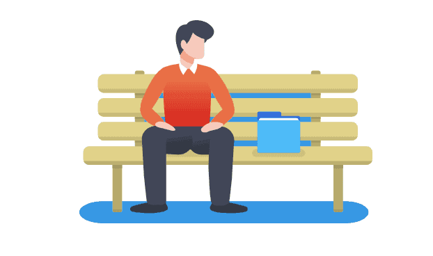 Mann sitzt auf einer Bank